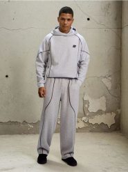 Spodnie wide leg z kontrastową lamówką - szary. Szare spodnie materiałowe męskie Sinsay, bez wzorów. Za 79.99 zł.