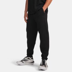 UA Unstoppable Fleece Spodnie Męskie Czarne. Czarne spodnie sportowe męskie Under Armour, z materiału. Za 603.99 zł.