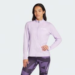 Koszulka Terrex Multi Climacool 1/2 Zip Long Sleeve. Czerwone bluzki damskie Adidas, l, bez wzorów, sportowe, bez kołnierzyka, bez ramiączek. Za 259.00 zł.