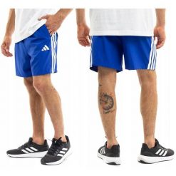 Spodenki treningowe męskie adidas. Niebieskie szorty męskie Adidas, bez kołnierzyka. Za 96.00 zł.