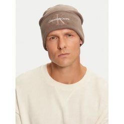 Czapka Calvin Klein. Brązowe czapki męskie CALVIN KLEIN, na zimę, bez wzorów. Za 209.99 zł.
