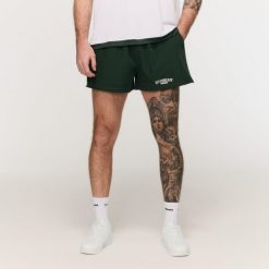 Szorty męskie fitness oversize zielone Varsity. Zielone szorty sportowe męskie GYMBEAM, l, z bawełny, na fitness i siłownię. Za 88.90 zł.
