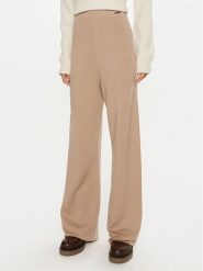 Calvin Klein Spodnie dresowe K20K207680 Beżowy Relaxed Fit. Brązowe spodnie dresowe damskie CALVIN KLEIN, l, bez wzorów, z dresówki. Za 559.99 zł.