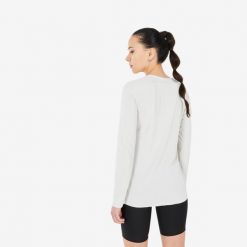 Koszulka turystyczna damska z długim rękawem Quechua MH500. Brązowe bluzki damskie QUECHUA, xl, bez wzorów, z materiału, sportowe, bez kołnierzyka, bez ramiączek. Za 79.99 zł.