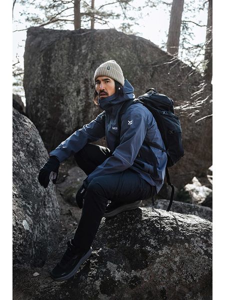 Halti Spodnie softshellowe "Vuoksi II" w kolorze czarnym rozmiar: L. Czarne spodnie materiałowe męskie Halti, bez wzorów, sportowe. Za 279.11 zł.