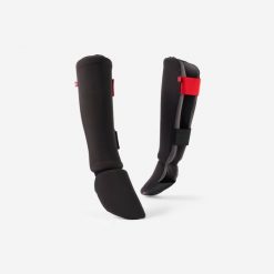 Nagolenniki z osłoną stopy do kick-boxingu 100 ergo. Czarne bokserki męskie OUTSHOCK, bez wzorów, z elastanu. Za 69.99 zł.
