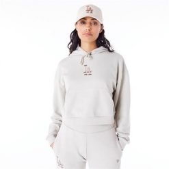 Bluza sportowa damska New Era 60435287. Brązowe bluzy sportowe damskie New Era, bez wzorów, bez ramiączek, z kapturem. Za 527.00 zł.