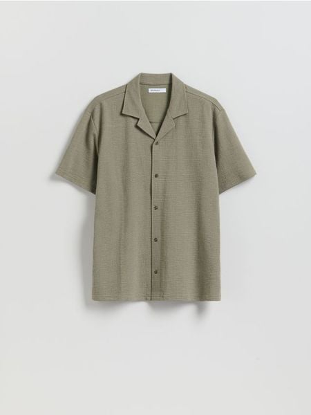 Strukturalna koszula regular fit - jasnozielony. Zielone koszule męskie Reserved, l, bez wzorów, z bawełny, bez kołnierzyka, bez ramiączek. Za 119.99 zł.