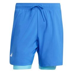 Szorty 2 w 1 adidas Club. Niebieskie szorty męskie Adidas, bez wzorów, z materiału, klasyczne. Za 197.50 zł.