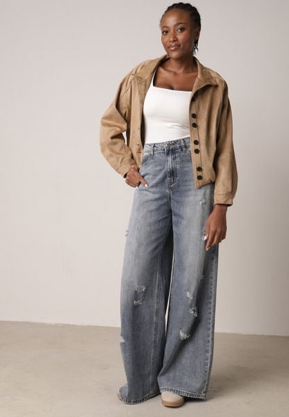 Niebieskie Bawełniane Jeansy Typu Palazzo Ozdobione Przetarciami i Dziurami Erivaine. Niebieskie jeansy damskie Born2be, z podwyższonym stanem. Za 139.99 zł.