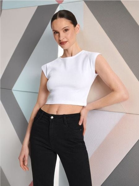 Koszulka crop top - biały. Białe t-shirty damskie Sinsay, l, bez wzorów, z bawełny, bez kołnierzyka. Za 15.99 zł.