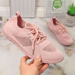 Buty sportowe damskie ażurowe pudrowy róż News 1020. Czerwone buty sportowe na co dzień damskie NEWS, w ażurowe wzory, z materiału. Za 49.50 zł.