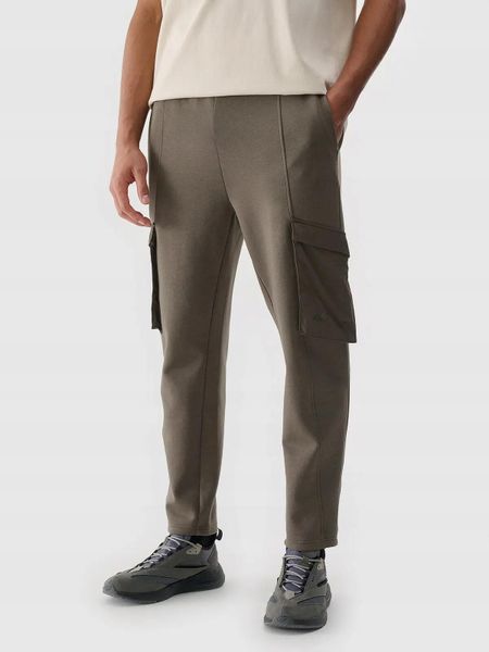 SPODNIE MĘSKIE 4F CASUAL CARGO S TTROM0990. Brązowe spodnie materiałowe męskie 4f, bez wzorów, casualowe. Za 169.99 zł.