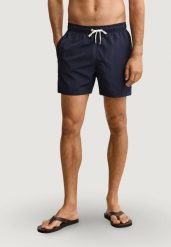 Bokserki pływackie Mężczyzna GANT SWIM SHORTS. Niebieskie kąpielówki męskie Gant, m, bez wzorów, z poliamidu. Za 258.40 zł.