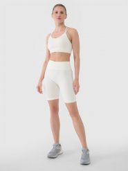 4F Legginsy kolarki bezszwowe treningowe damskie - białe M/L. Białe legginsy damskie 4f, l, bez wzorów, z dzianiny. W wyprzedaży za 79.99 zł.