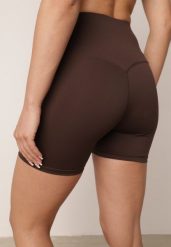 Brązowe Szorty Kolarki z Wysokim Stanem i Przeszyciem w Talii Daemtora. Brązowe spodenki sportowe damskie Born2be, l, na fitness i siłownię. Za 49.99 zł.