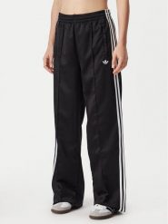 Adidas Spodnie dresowe Satin Sst KS9372 Czarny Loose Fit. Czarne spodnie dresowe damskie Adidas, xs, bez wzorów, z dresówki. Za 314.99 zł.