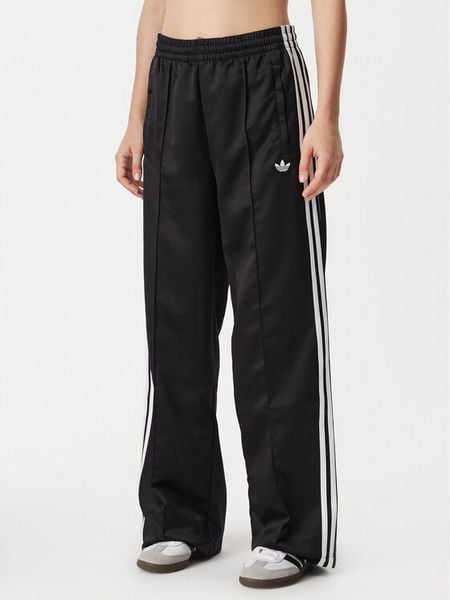 Adidas Spodnie dresowe Satin Sst KS9372 Czarny Loose Fit. Czarne spodnie dresowe damskie Adidas, xs, bez wzorów, z dresówki. Za 314.99 zł.