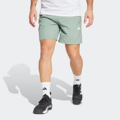 Spodenki fitness męskie ADIDAS. Zielone szorty męskie Adidas, m, z materiału, na fitness i siłownię. W wyprzedaży za 99.99 zł.