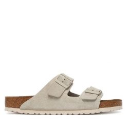 Klapki Birkenstock. Klapki damskie Birkenstock, bez wzorów, bez obcasa. Za 629.99 zł.