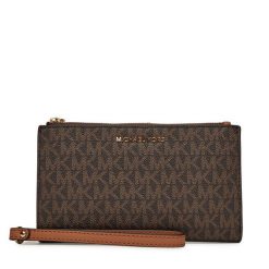 Portfel MICHAEL Michael Kors. Brązowe portfele damskie MICHAEL Michael Kors, bez wzorów. Za 659.99 zł.