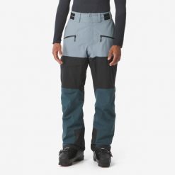Spodnie narciarskie i snowboardowe męskie Quechua. Czarne spodnie materiałowe męskie WED'ZE, bez wzorów, z materiału. Za 399.99 zł.