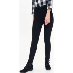 LEGGINSY DAMSKIE, Z WIĄZANIEM. Czarne legginsy damskie TROLL, s, bez wzorów. W wyprzedaży za 39.99 zł.