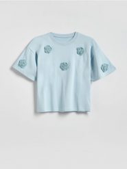 T-shirt z aplikacją - jasnoniebieski. Niebieskie koszulki dziewczęce Reserved, z aplikacjami, z bawełny, bez ramiączek. Za 39.99 zł.