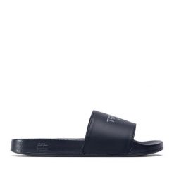 Klapki Tommy Hilfiger. Niebieskie klapki damskie Tommy Hilfiger, bez wzorów, bez obcasa. Za 119.99 zł.