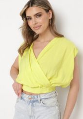 Żółty Top z Wiskozy z Kopertowym Dekoltem z Ukrytym Suwakiem z Boku Birilla. Żółte topy damskie Born2be, l, bez wzorów, z materiału, bez kołnierzyka. Za 74.99 zł.