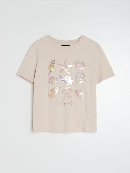 Bawełniana koszulka z ozdobnymi cekinami - kremowy. Białe t-shirty damskie Sinsay, l, bez wzorów, z bawełny, bez kołnierzyka. Za 25.99 zł.