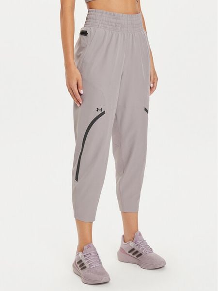 Under Armour Spodnie outdoor UA Unstoppable 1382741 Beżowy Loose Fit. Brązowe spodnie sportowe damskie Under Armour, m, z syntetyku, outdoorowe. Za 249.99 zł.