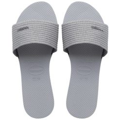 Klapki Havaianas Model 4147312 Kolor Szary. Szare klapki damskie Havaianas, bez wzorów, bez obcasa. Za 179.99 zł.