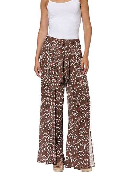 Heine Spodnie w kolorze czerwonobrązowym rozmiar: 36. Brązowe spodnie materiałowe damskie Heine, bez wzorów, z materiału. Za 100.04 zł.