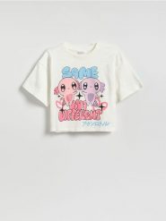 Luźny t-shirt z nadrukiem Axolotla - złamana biel. Koszulki dziewczęce Reserved, bez wzorów, z bawełny, bez ramiączek. Za 39.99 zł.