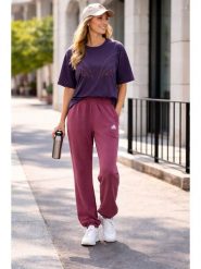 Adidas Koszulka w kolorze fioletowym rozmiar: S. Różowe t-shirty damskie Adidas, s, bez wzorów, z bawełny, bez kołnierzyka. Za 118.84 zł.
