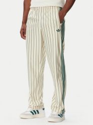 Adidas Spodnie dresowe Firebird Pinstripes KT4300 Kremowy Regular Fit. Białe spodnie dresowe męskie Adidas, bez wzorów, z dresówki. Za 349.99 zł.