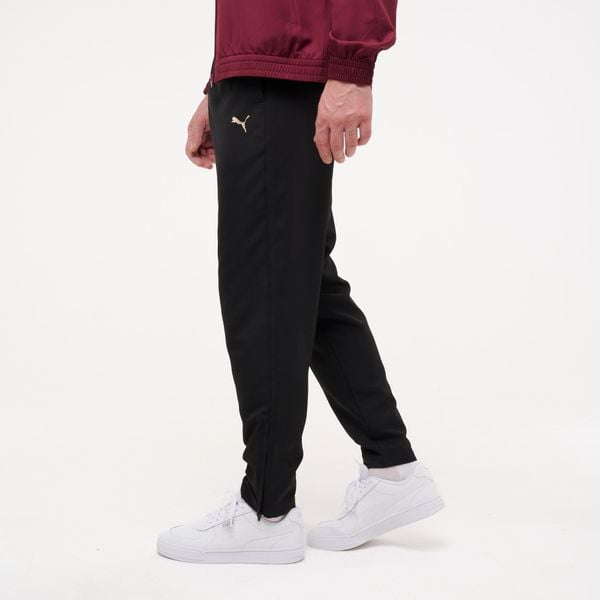 Spodnie dresowe męskie Puma Woven Gym & Pilates. Czarne spodnie dresowe męskie Puma, bez wzorów, z dresówki. Za 149.99 zł.