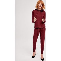 2-częściowy zestaw w kolorze bordowym - bluza, spodnie. Czerwone bluzy z kapturem damskie ZOCHA, s. W wyprzedaży za 359.95 zł.