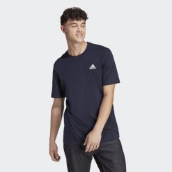 Koszulka sportowa męska adidas Essentials. Niebieskie t-shirty sportowe męskie Adidas, l, z bawełny, bez ramiączek, do piłki nożnej. Za 119.00 zł.