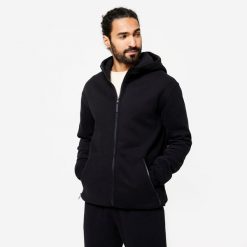 Bluza na zamek z kapturem męska Nyamba Gym & Pilates 520. Niebieskie bluzy sportowe męskie DOMYOS, bez wzorów, z bawełny, sportowe, bez kołnierzyka, bez ramiączek. W wyprzedaży za 129.99 zł.