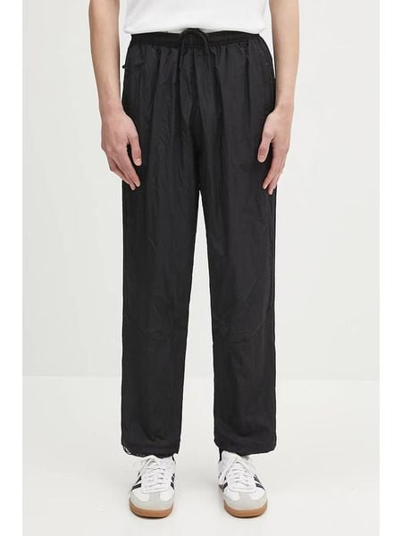 Adidas Spodnie dresowe w kolorze czarnym rozmiar: L. Czarne spodnie dresowe męskie Adidas, bez wzorów, z dresówki. Za 135.49 zł.