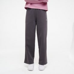 Spodnie dresowe damskie Puma Gym & Pilates. Czarne spodnie dresowe damskie Puma, l, z bawełny, na fitness i siłownię. Za 129.99 zł.
