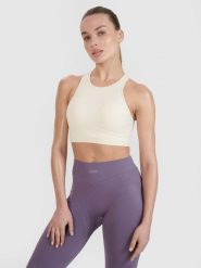 4F Biustonosz treningowy bezszwowy ze średnim wsparciem 4F x Anna Lewandowska - biały L/XL. Białe biustonosze sportowe damskie 4f, bez wzorów, z dzianiny. Za 99.99 zł.