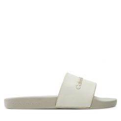 Klapki Calvin Klein Jeans. Klapki damskie Calvin Klein Jeans, bez wzorów, z jeansu, bez obcasa. Za 169.99 zł.