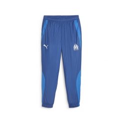 Tkane spodnie dresowe Prematch om 2023/24. Niebieskie spodnie dresowe męskie Puma, bez wzorów, z dresówki. W wyprzedaży za 190.50 zł.