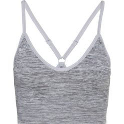 Top sportowy damski Padded Seamless Soft 2.0. Szare topy sportowe damskie Odlo, m, bez wzorów, z materiału, bez ramiączek. Za 108.15 zł.