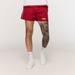 Szorty męskie fitness oversize czerwone Varsity. Czerwone szorty męskie GYMBEAM, m, z bawełny, na fitness i siłownię. Za 88.90 zł.