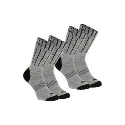 Skarpety turystyczne SH100 warm mid. Szare skarpetki damskie QUECHUA, bez wzorów, z elastanu. Za 29.99 zł.