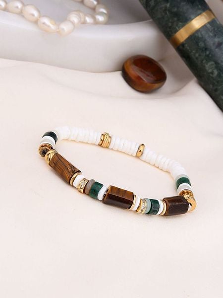 Charlize Pozłacana bransoletka z jaspisami i kamieniami ozdobnymi rozmiar: onesize. Białe bransoletki damskie Charlize, pozłacane. Za 83.03 zł.